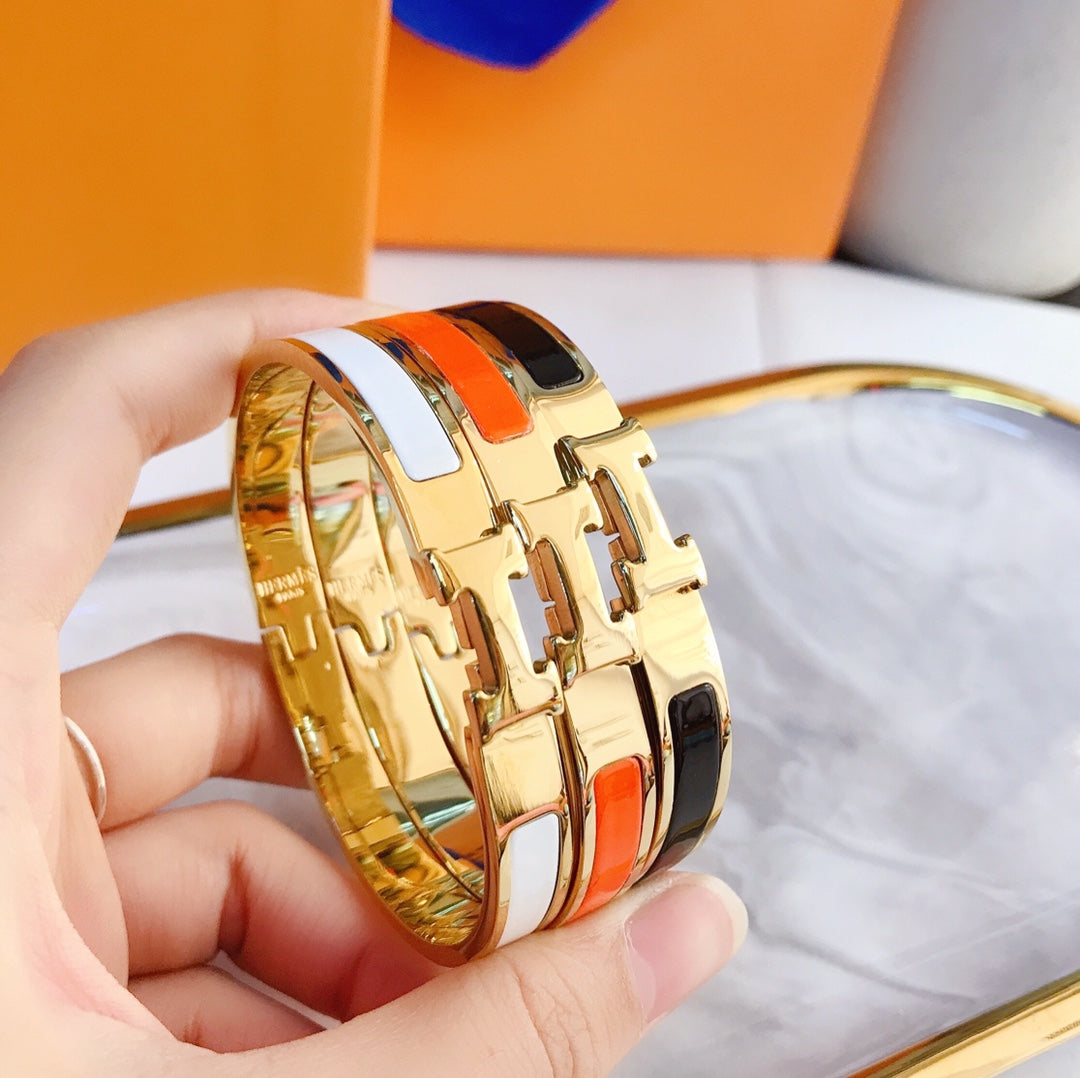 Gold bracelet | White, orange and black | Stainless Steel